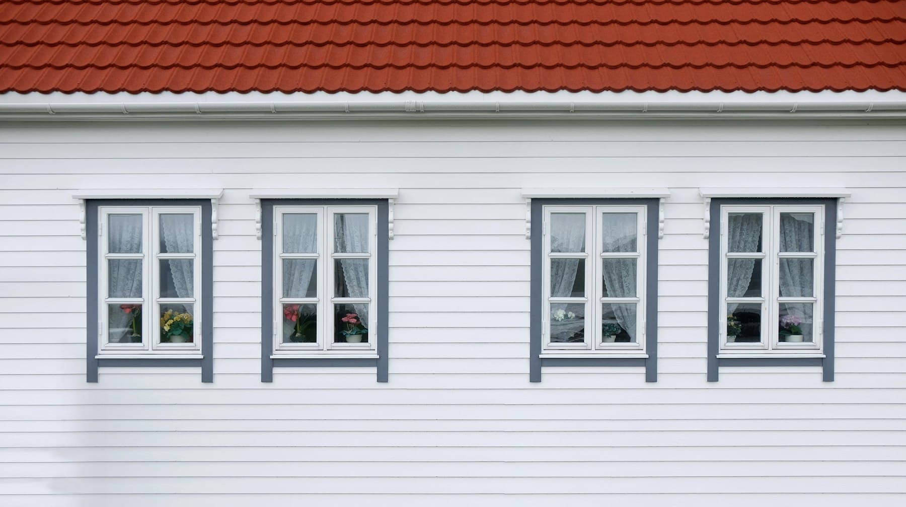 Replacement windows on the front of a single-family home